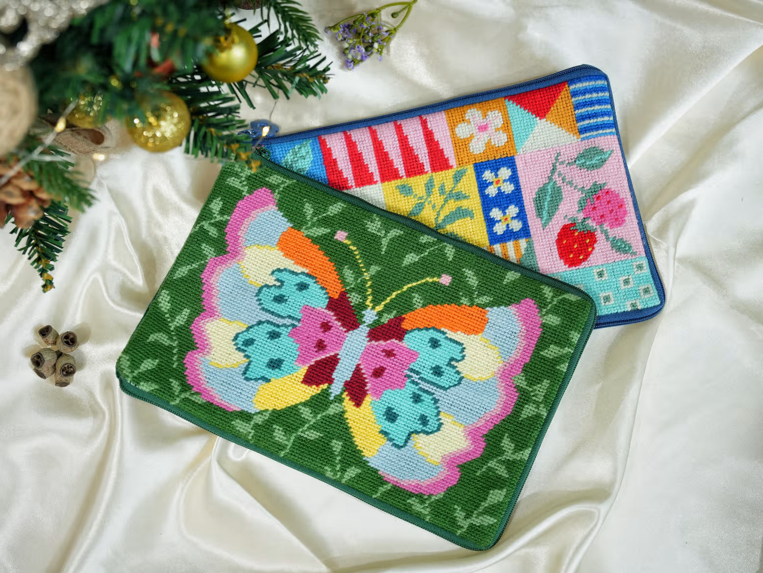 Artglee's Christmas-themed Half Stitch Kits featuring a vibrant butterfly design and colorful blue patchwork. Perfect for creating festive, handmade gifts and home decor this holiday season.