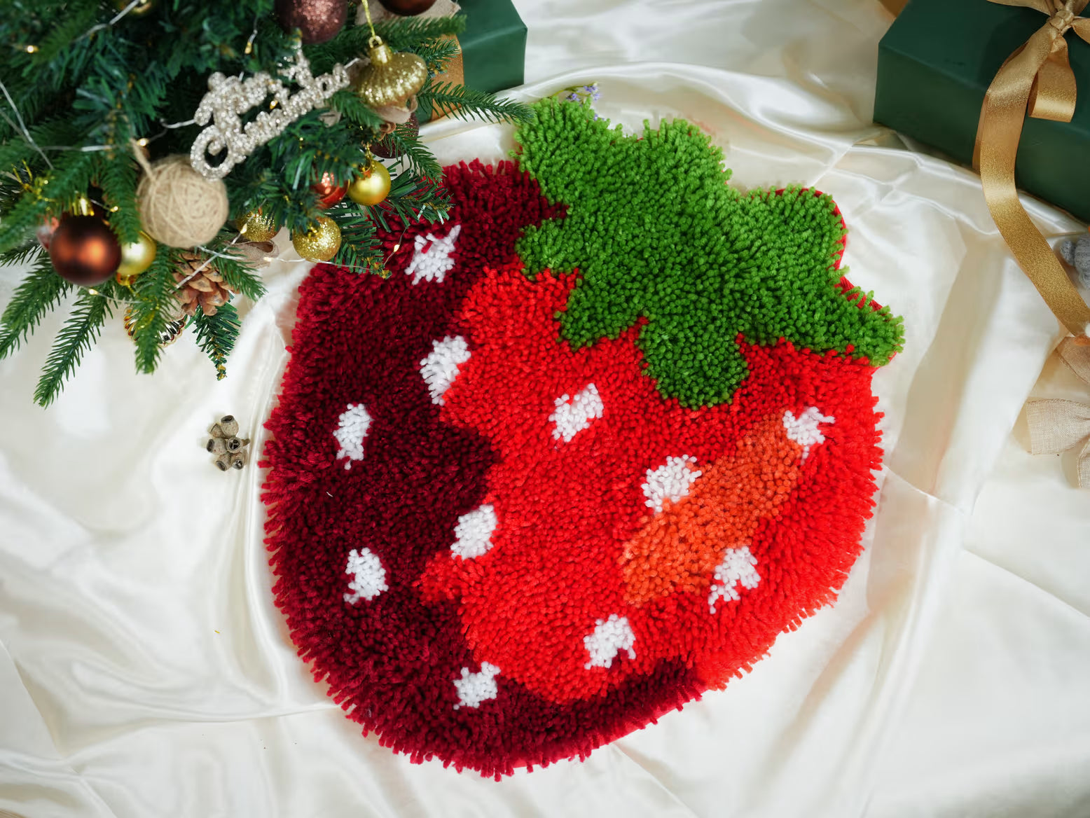 Artglee's Christmas-themed Latch Hook Kit featuring a vibrant strawberry design. Perfect for creating festive, handmade decorations or gifts for the holiday season.