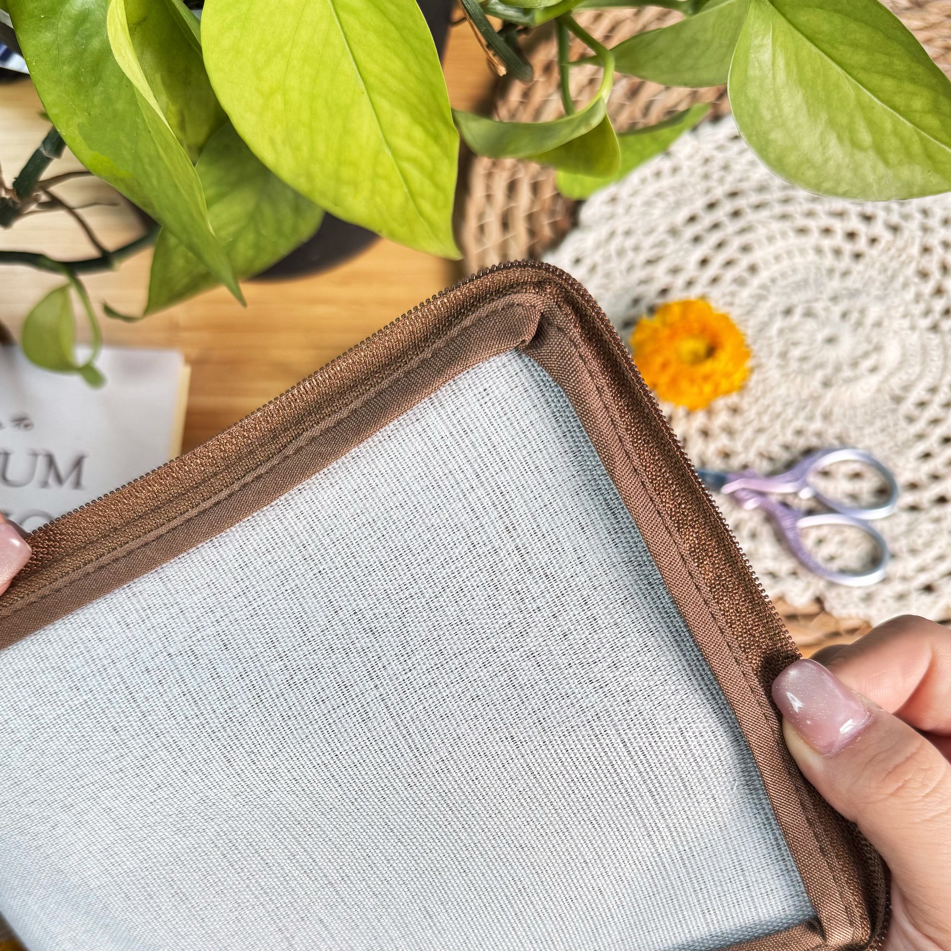 Autumn Forest Half-Stitch Bag Kit lining detail, showing the interior fabric, neat edge binding, and sturdy construction of the handmade embroidered pouch.
