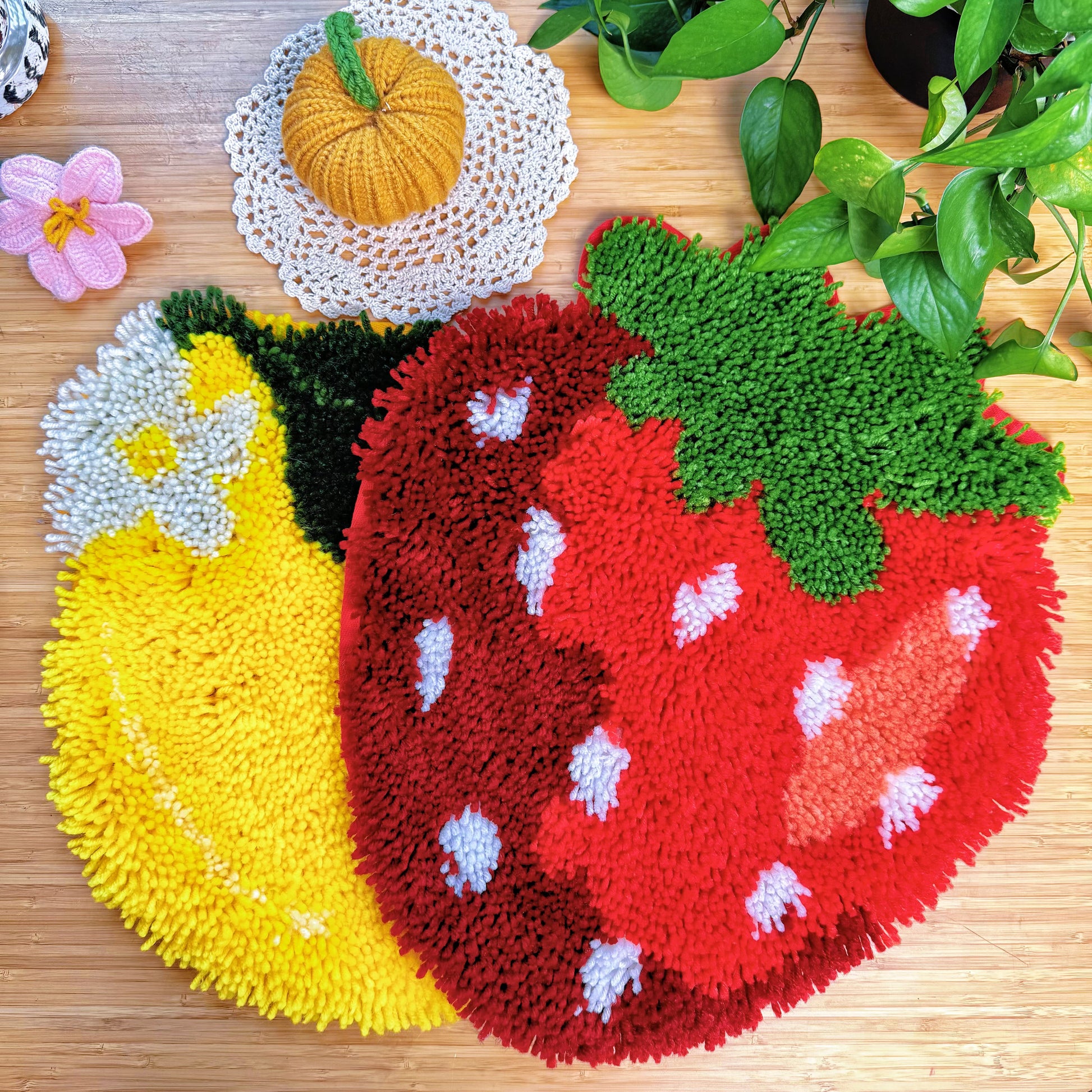 Sweet Strawberry latch hook mat displayed together with a yellow lemon latch hook mat